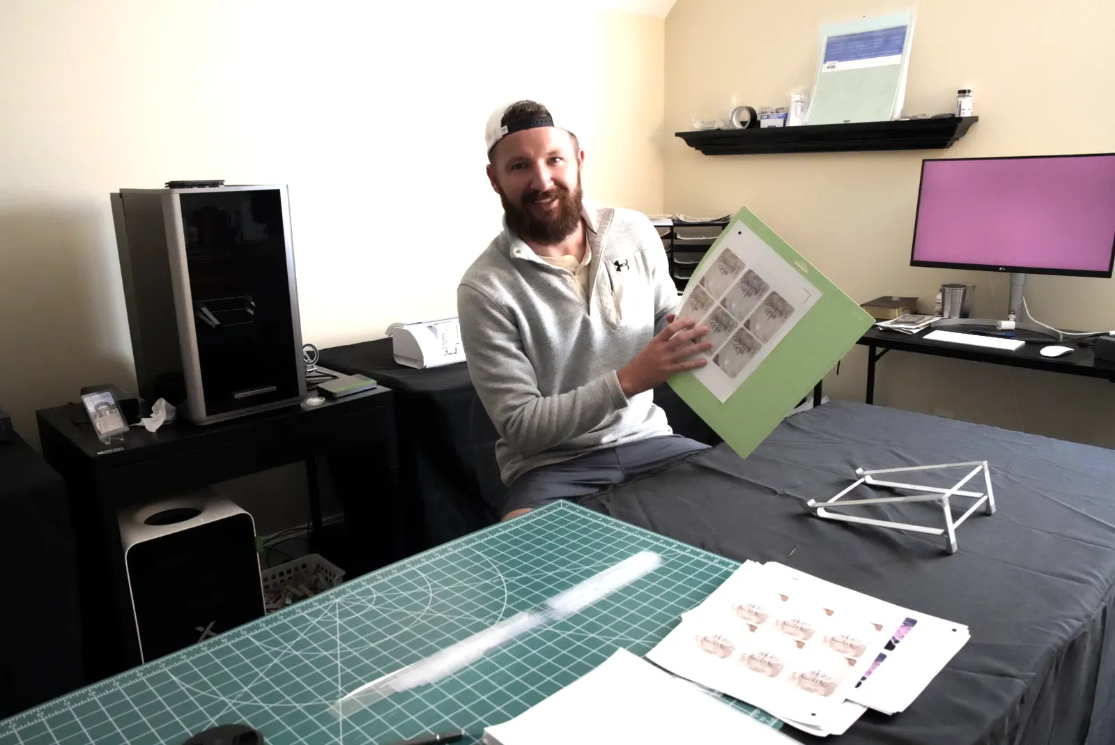 Ben at our cutting table with a sheet of skins