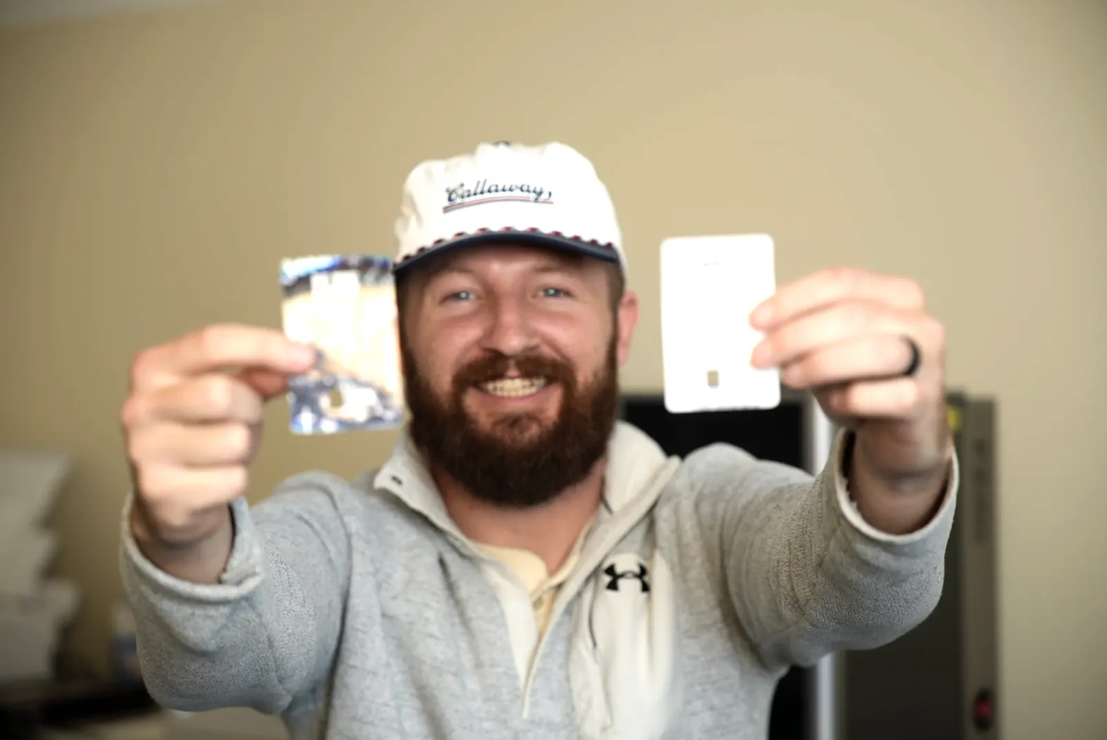 Ben holding up two finished card skins